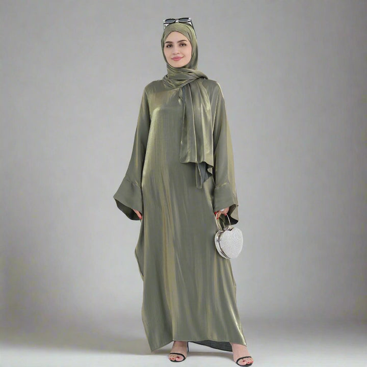 Get trendy with Nessa Shimmer Abaya with Hijab - Olive - Dresses available at Voilee NY. Grab yours for $54.90 today!