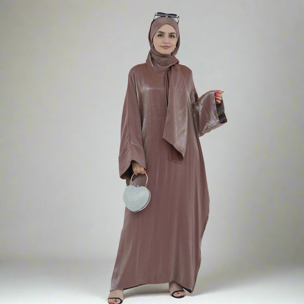 Get trendy with Nessa Shimmer Abaya with Hijab - Mocha - Dresses available at Voilee NY. Grab yours for $54.90 today!