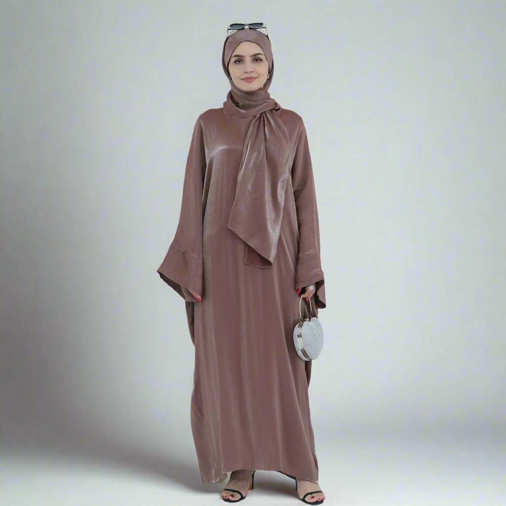 Get trendy with Nessa Shimmer Abaya with Hijab - Mocha - Dresses available at Voilee NY. Grab yours for $54.90 today!