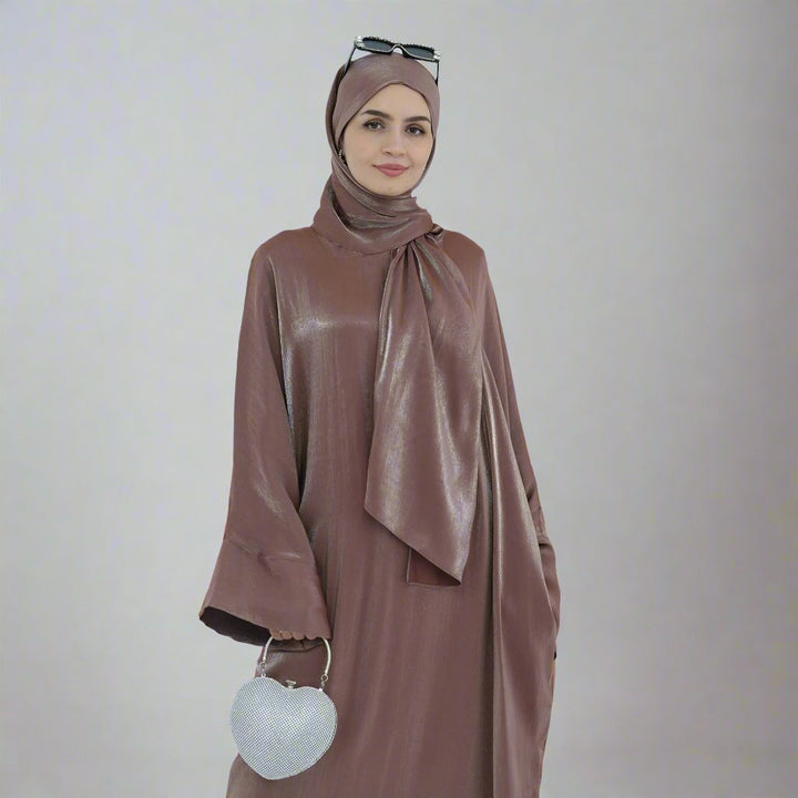 Get trendy with Nessa Shimmer Abaya with Hijab - Mocha - Dresses available at Voilee NY. Grab yours for $54.90 today!