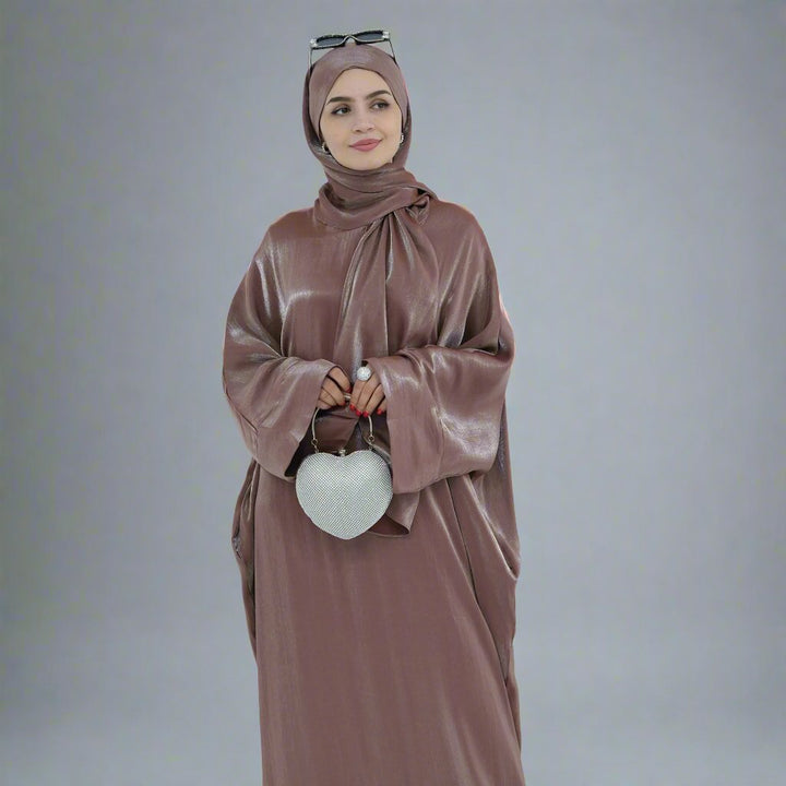 Get trendy with Nessa Shimmer Abaya with Hijab - Mocha - Dresses available at Voilee NY. Grab yours for $54.90 today!