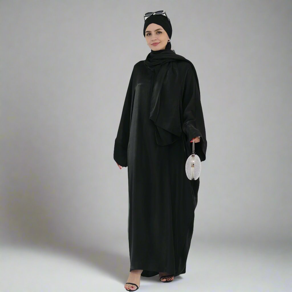 Get trendy with Nessa Shimmer Abaya with Hijab - Black - Dresses available at Voilee NY. Grab yours for $54.90 today!