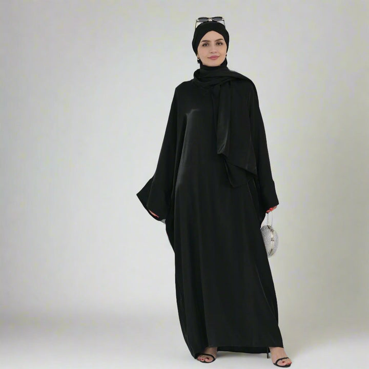 Get trendy with Nessa Shimmer Abaya with Hijab - Black - Dresses available at Voilee NY. Grab yours for $54.90 today!