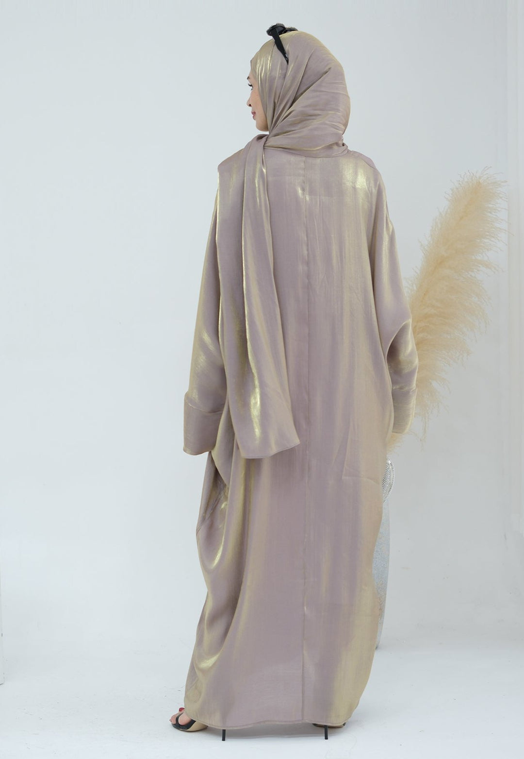 Get trendy with Nessa Shimmer Abaya with Hijab - Beige - Dresses available at Voilee NY. Grab yours for $54.90 today!