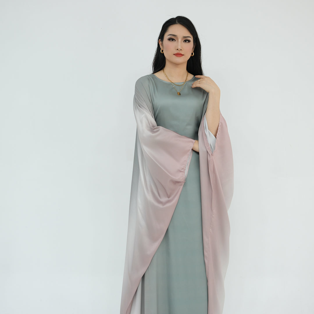 Get trendy with Raya Ombre Butterfly Abaya - Sage - Dresses available at Voilee NY. Grab yours for $64.99 today!