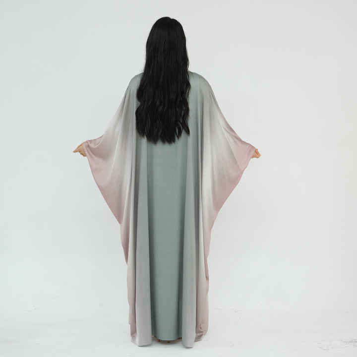 Get trendy with Raya Ombre Butterfly Abaya - Sage - Dresses available at Voilee NY. Grab yours for $64.99 today!