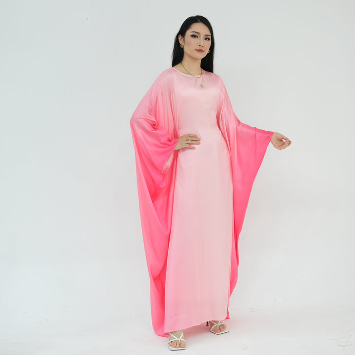 Get trendy with Raya Ombre Butterfly Abaya - Pink - Dresses available at Voilee NY. Grab yours for $64.99 today!