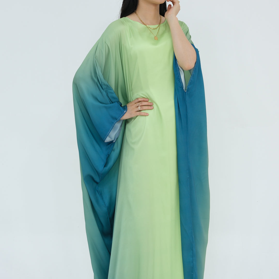 Get trendy with Raya Ombre Butterfly Abaya - Green - Dresses available at Voilee NY. Grab yours for $64.99 today!