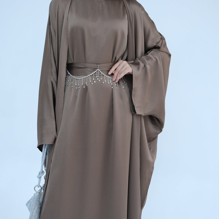 Get trendy with Reina Textured Batwing Abaya Set - Taupe -  available at Voilee NY. Grab yours for $109.90 today!