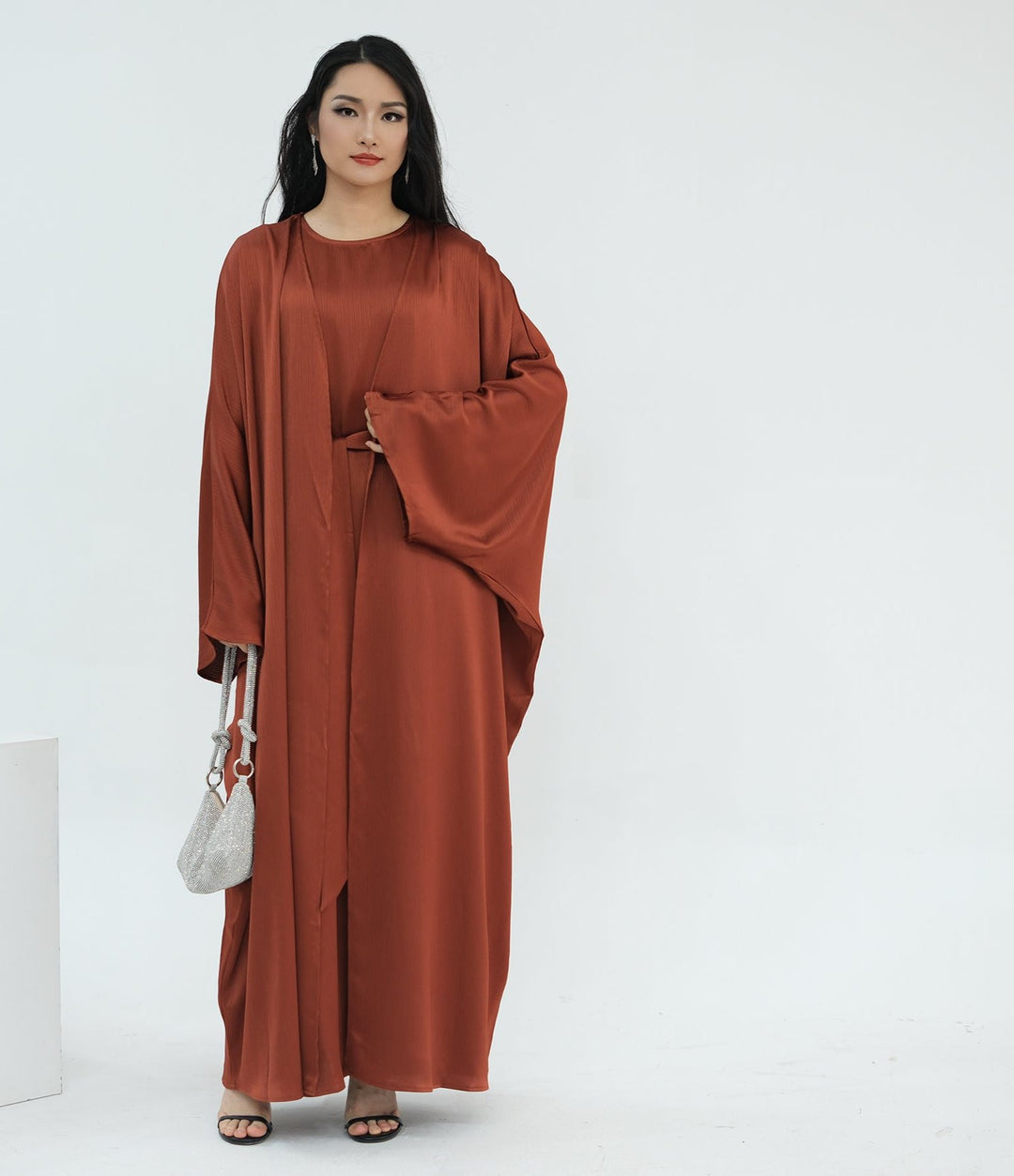 Get trendy with Reina Textured Batwing Abaya Set - Brick -  available at Voilee NY. Grab yours for $109.90 today!