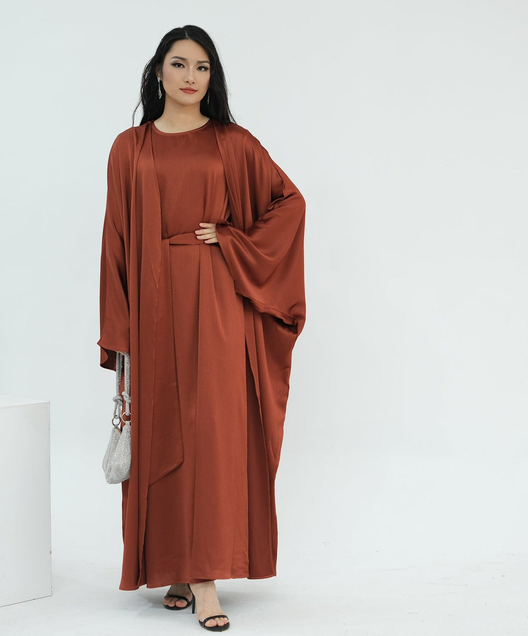 Get trendy with Reina Textured Batwing Abaya Set - Brick -  available at Voilee NY. Grab yours for $109.90 today!