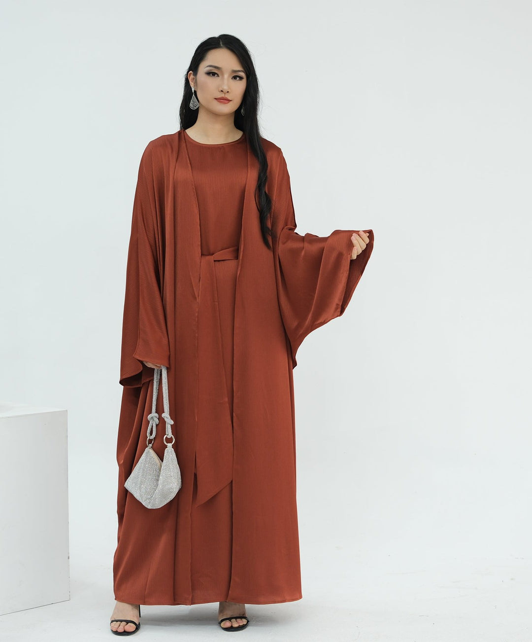 Get trendy with Reina Textured Batwing Abaya Set - Brick -  available at Voilee NY. Grab yours for $109.90 today!