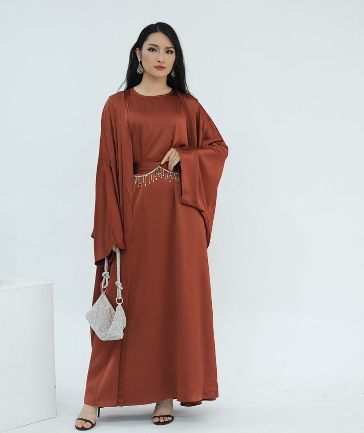 Get trendy with Reina Textured Batwing Abaya Set - Brick -  available at Voilee NY. Grab yours for $109.90 today!