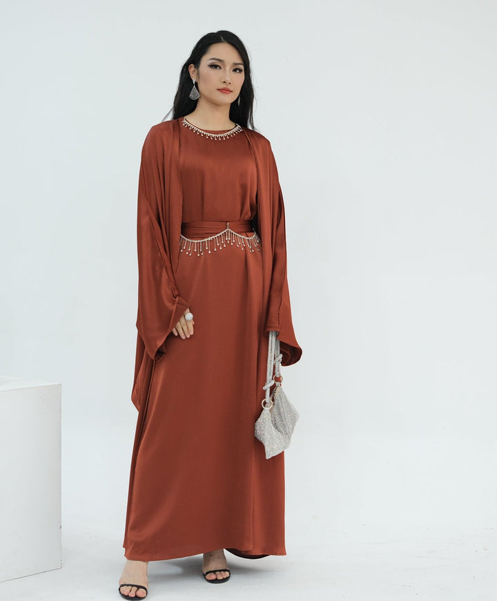 Get trendy with Reina Textured Batwing Abaya Set - Brick -  available at Voilee NY. Grab yours for $109.90 today!