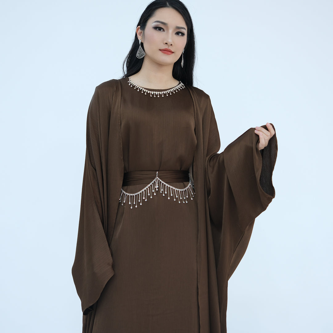 Get trendy with Reina Textured Batwing Abaya Set - Coffee -  available at Voilee NY. Grab yours for $109.90 today!