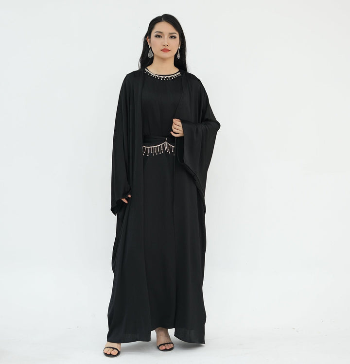 Get trendy with Reina Textured Batwing Abaya Set - Black -  available at Voilee NY. Grab yours for $109.90 today!