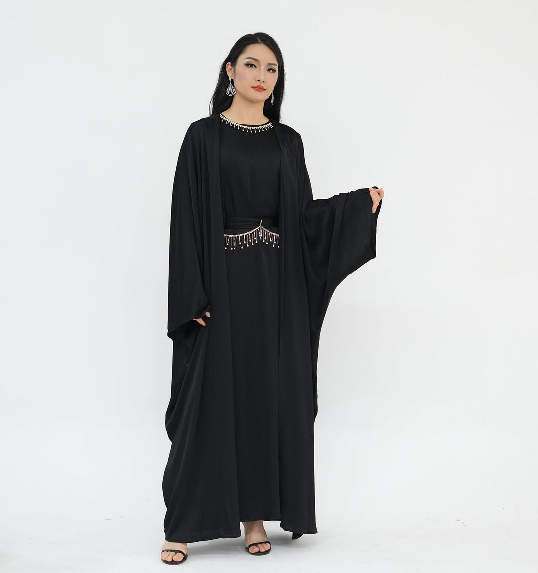 Get trendy with Reina Textured Batwing Abaya Set - Black -  available at Voilee NY. Grab yours for $109.90 today!