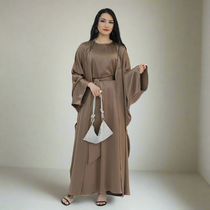 Get trendy with Reina Textured Batwing Abaya Set - Taupe -  available at Voilee NY. Grab yours for $109.90 today!