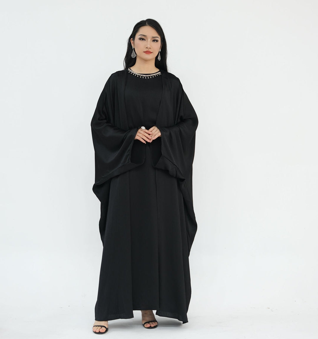 Get trendy with Reina Textured Batwing Abaya Set - Black -  available at Voilee NY. Grab yours for $109.90 today!