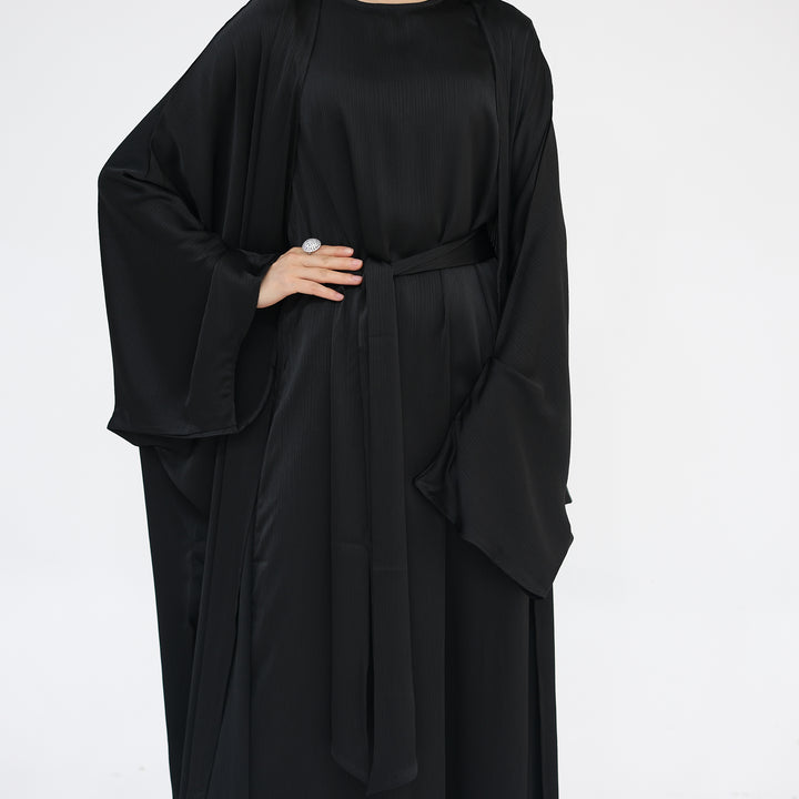 Get trendy with Reina Textured Batwing Abaya Set - Black -  available at Voilee NY. Grab yours for $109.90 today!