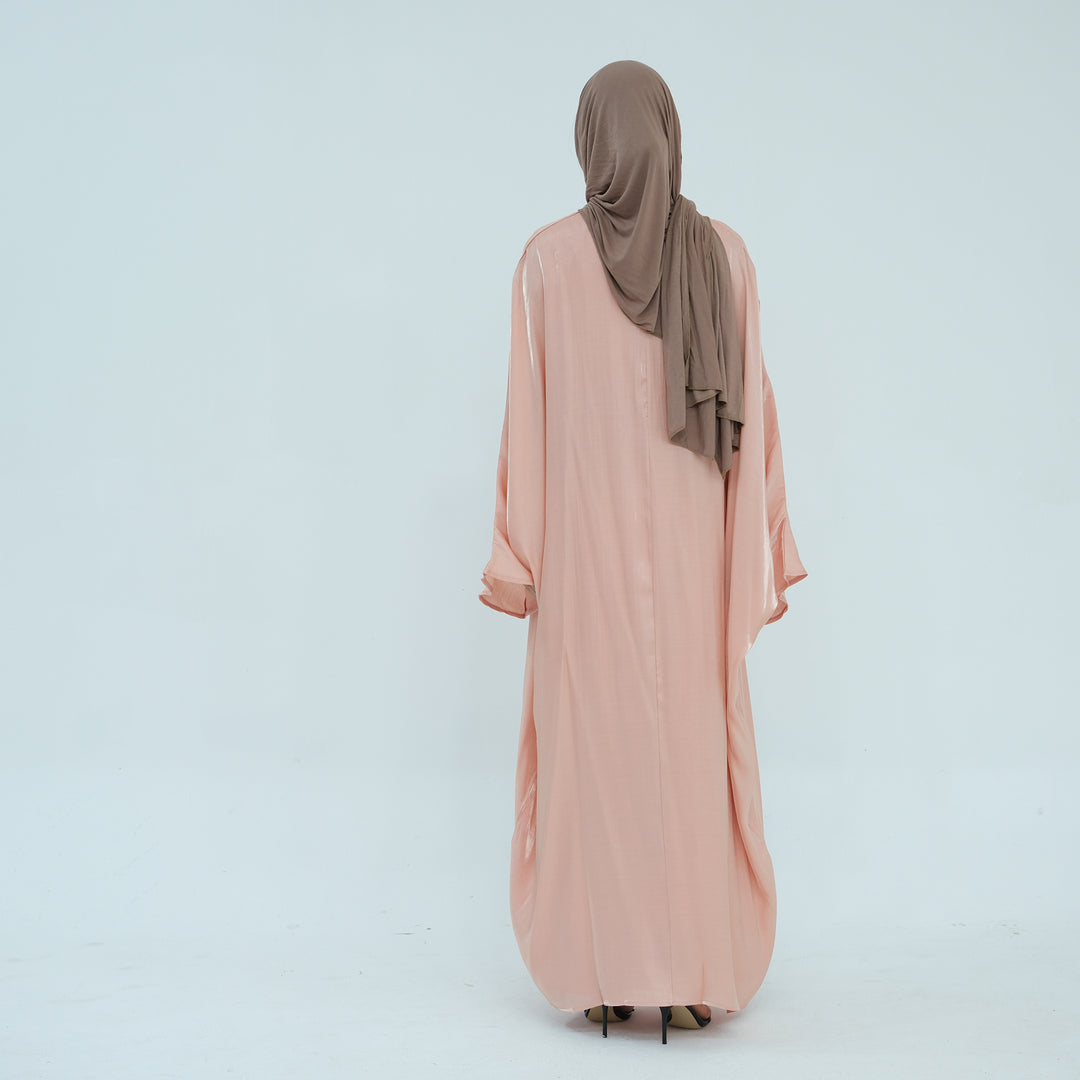 Get trendy with Tasnim Batwing Shimmer Abaya Set - Coral -  available at Voilee NY. Grab yours for $89.90 today!