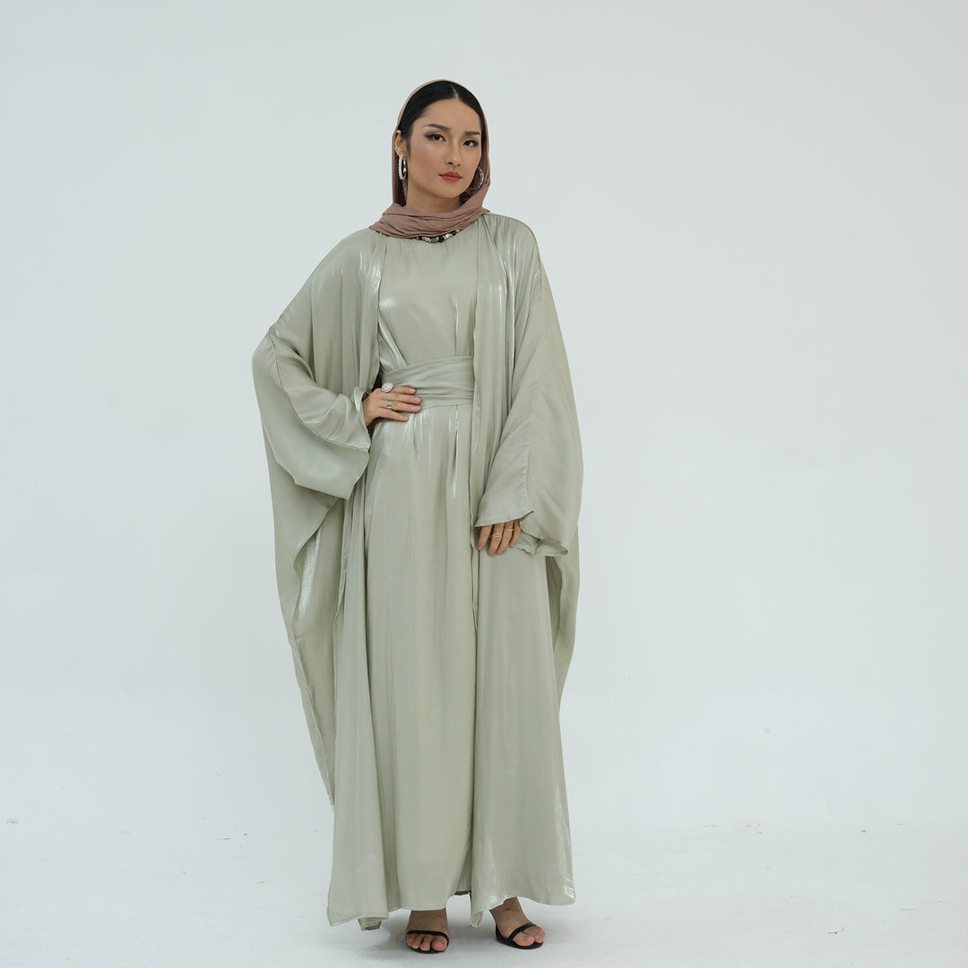 Get trendy with Tasnim Batwing Shimmer Abaya Set - Sage -  available at Voilee NY. Grab yours for $89.90 today!