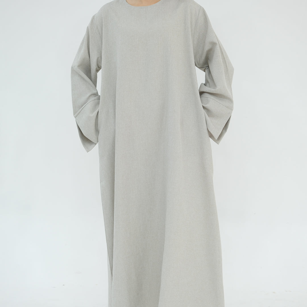 Get trendy with Heather Everyday Abaya - Sand - Dresses available at Voilee NY. Grab yours for $49.90 today!