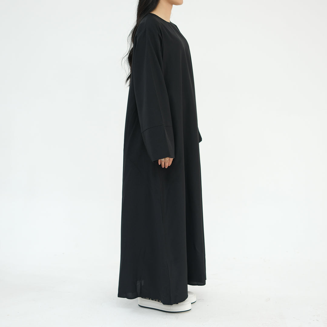 Get trendy with Heather Everyday Abaya - Black - Dresses available at Voilee NY. Grab yours for $49.90 today!