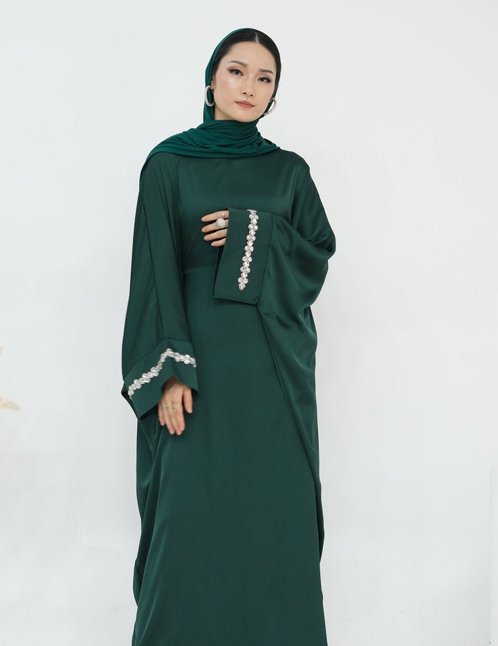 Get trendy with Delisa Butterfly Satin Abaya - Emerald -  available at Voilee NY. Grab yours for $74.90 today!