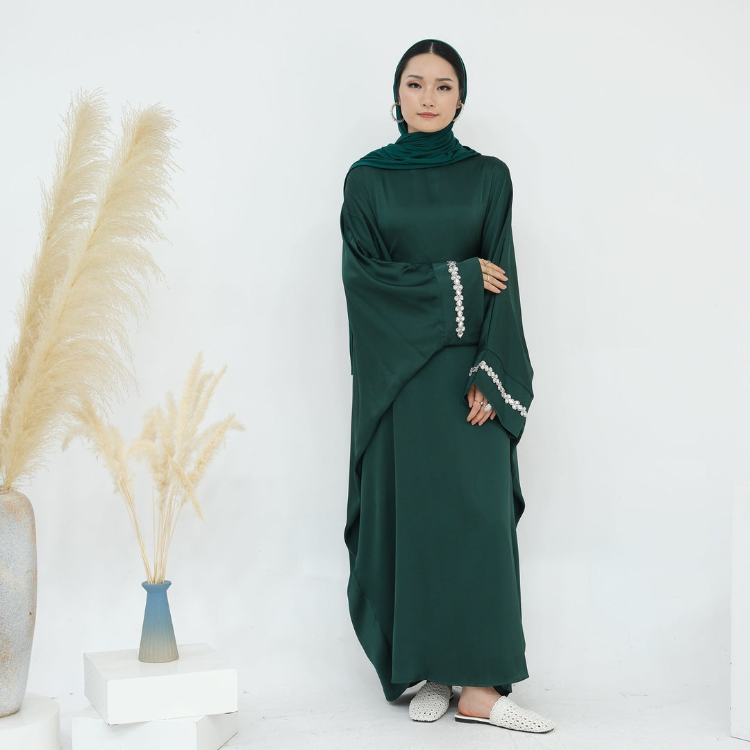 Get trendy with Delisa Butterfly Satin Abaya - Emerald -  available at Voilee NY. Grab yours for $74.90 today!