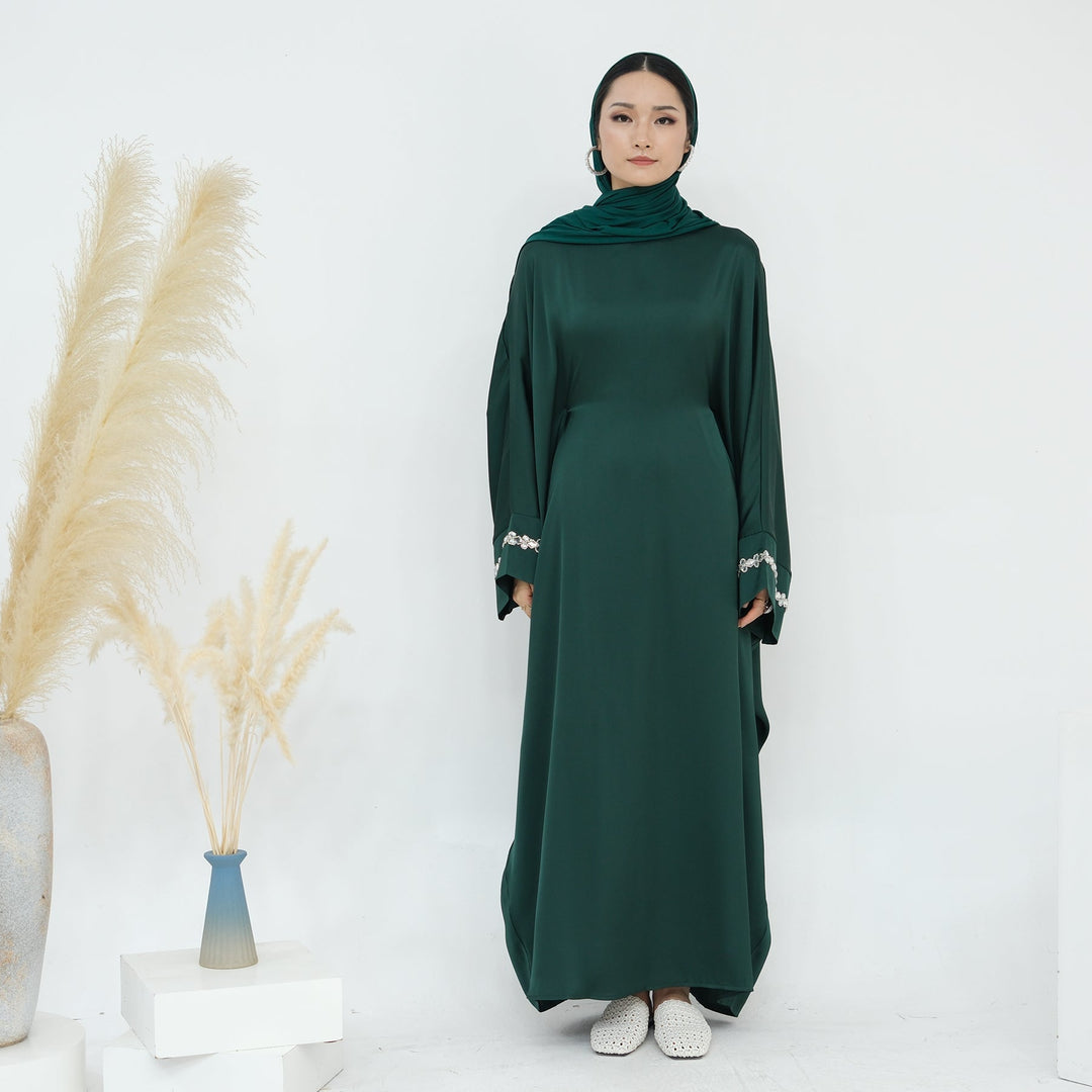 Get trendy with Delisa Butterfly Satin Abaya - Emerald -  available at Voilee NY. Grab yours for $74.90 today!