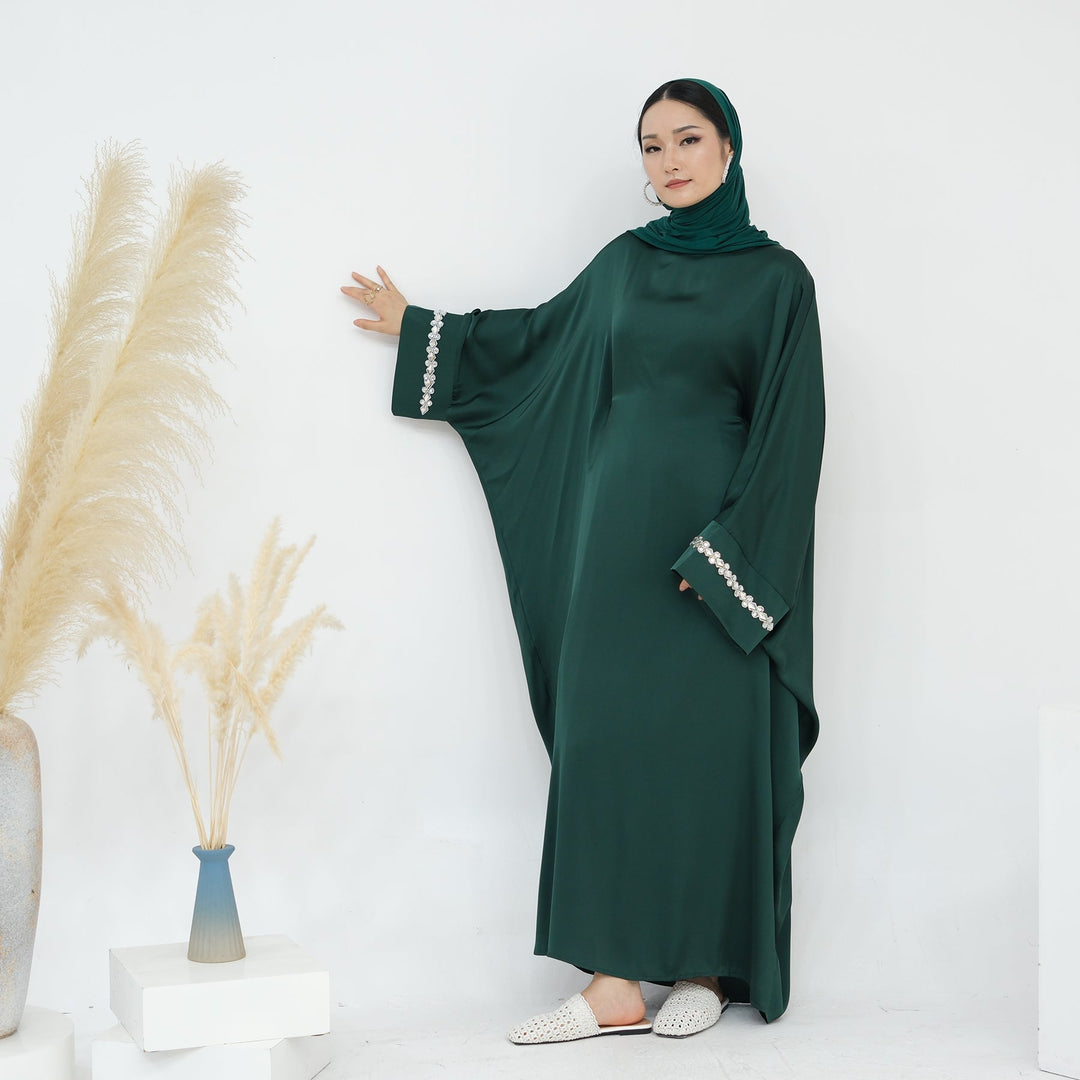 Get trendy with Delisa Butterfly Satin Abaya - Emerald -  available at Voilee NY. Grab yours for $74.90 today!