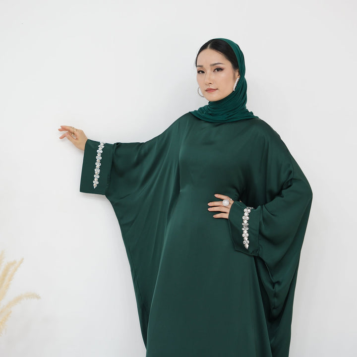 Get trendy with Delisa Butterfly Satin Abaya - Emerald -  available at Voilee NY. Grab yours for $74.90 today!