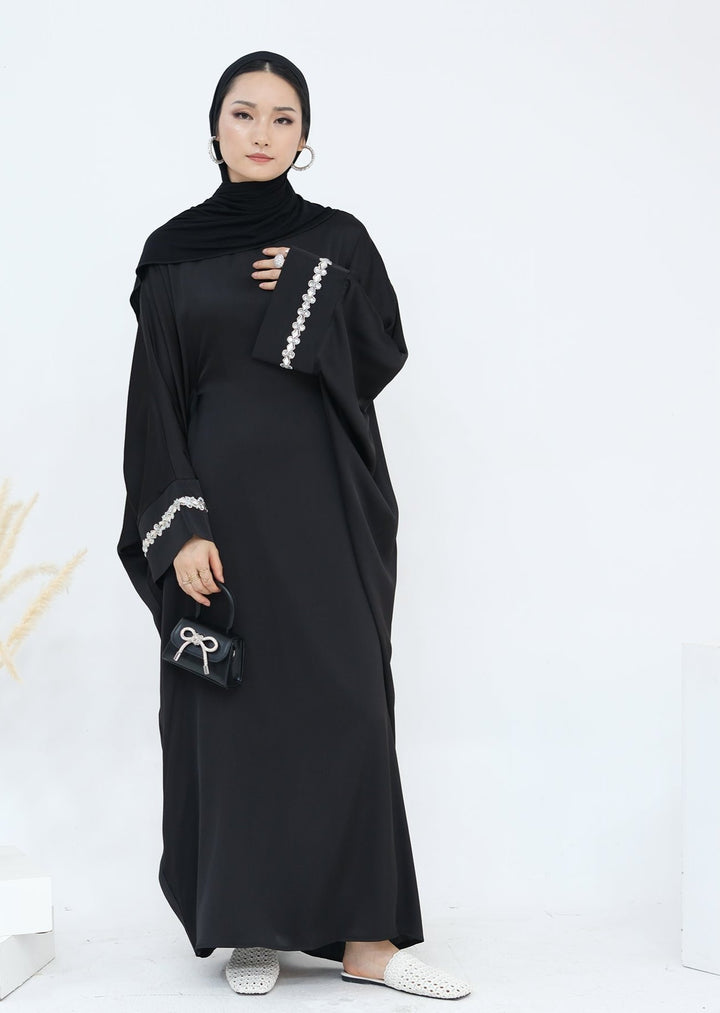 Get trendy with Delisa Butterfly Satin Abaya - Black -  available at Voilee NY. Grab yours for $74.90 today!