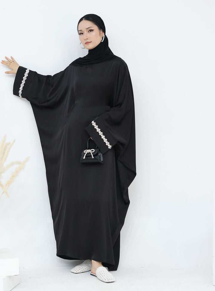 Get trendy with Delisa Butterfly Satin Abaya - Black -  available at Voilee NY. Grab yours for $74.90 today!