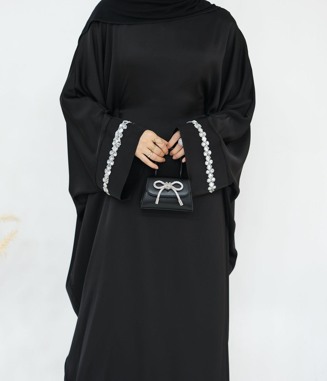 Get trendy with Delisa Butterfly Satin Abaya - Black -  available at Voilee NY. Grab yours for $74.90 today!