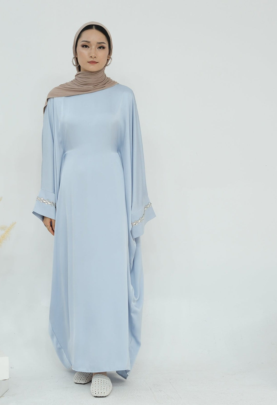 Get trendy with Delisa Butterfly Satin Abaya - Blue -  available at Voilee NY. Grab yours for $74.90 today!