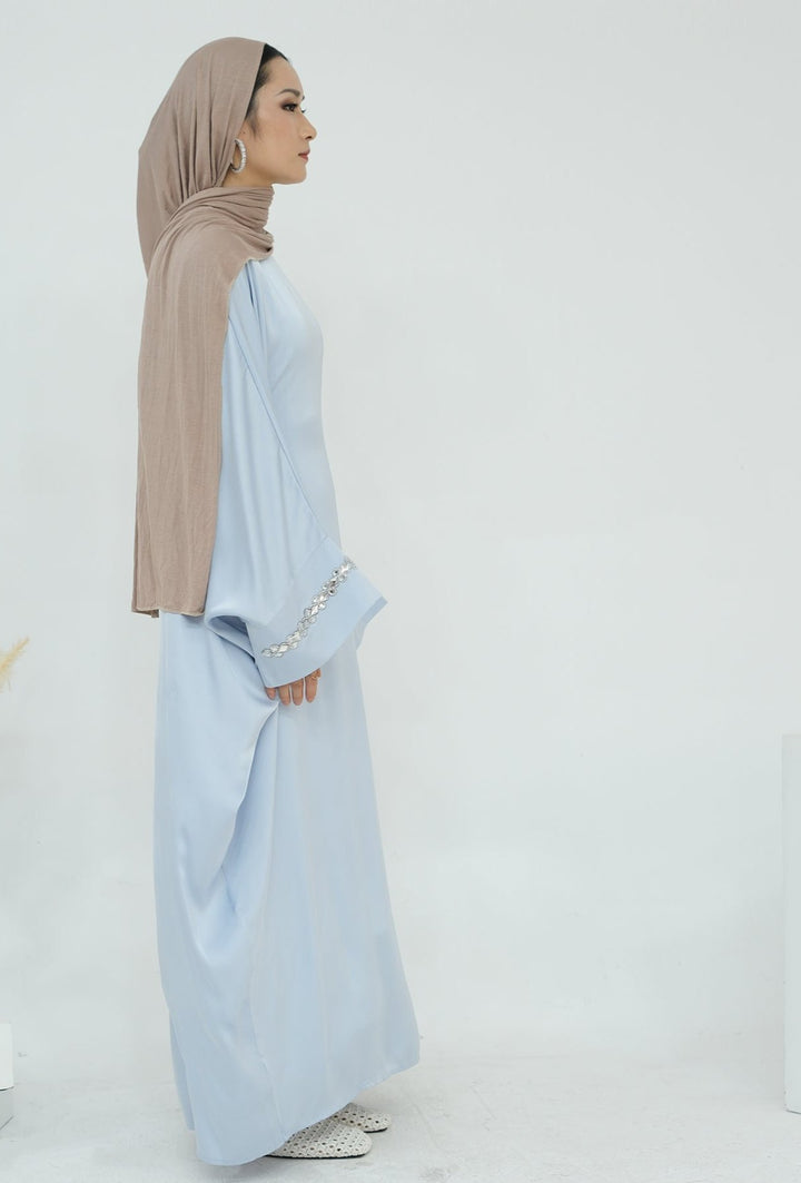 Get trendy with Delisa Butterfly Satin Abaya - Blue -  available at Voilee NY. Grab yours for $74.90 today!