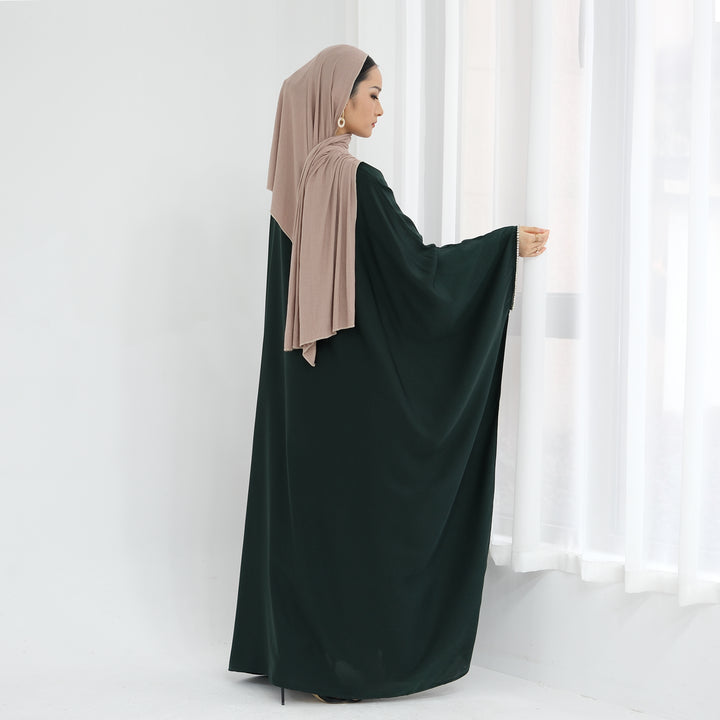 Get trendy with Davina Butterfly Satin Abaya - Emerald -  available at Voilee NY. Grab yours for $69.90 today!