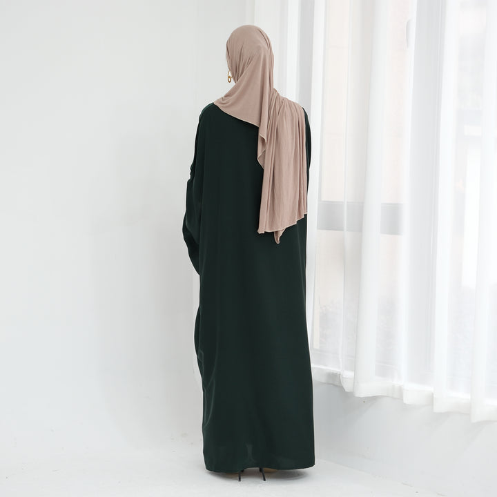 Get trendy with Davina Butterfly Satin Abaya - Emerald -  available at Voilee NY. Grab yours for $69.90 today!