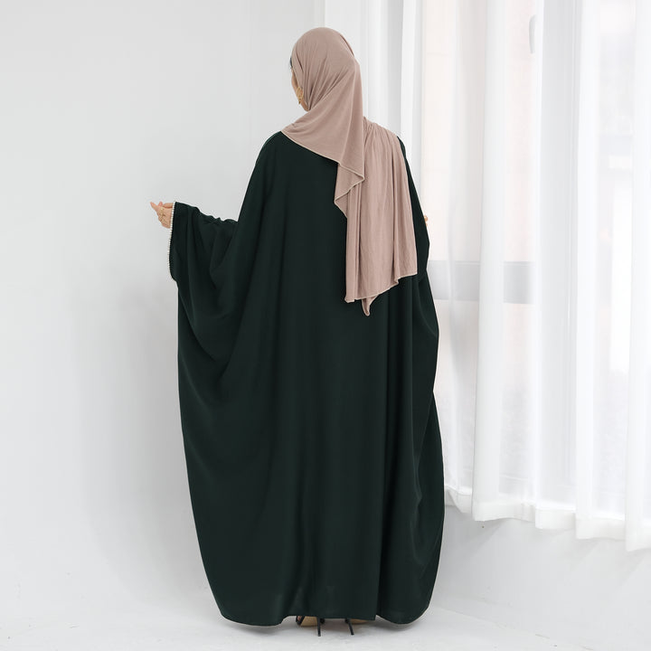 Get trendy with Davina Butterfly Satin Abaya - Emerald -  available at Voilee NY. Grab yours for $69.90 today!