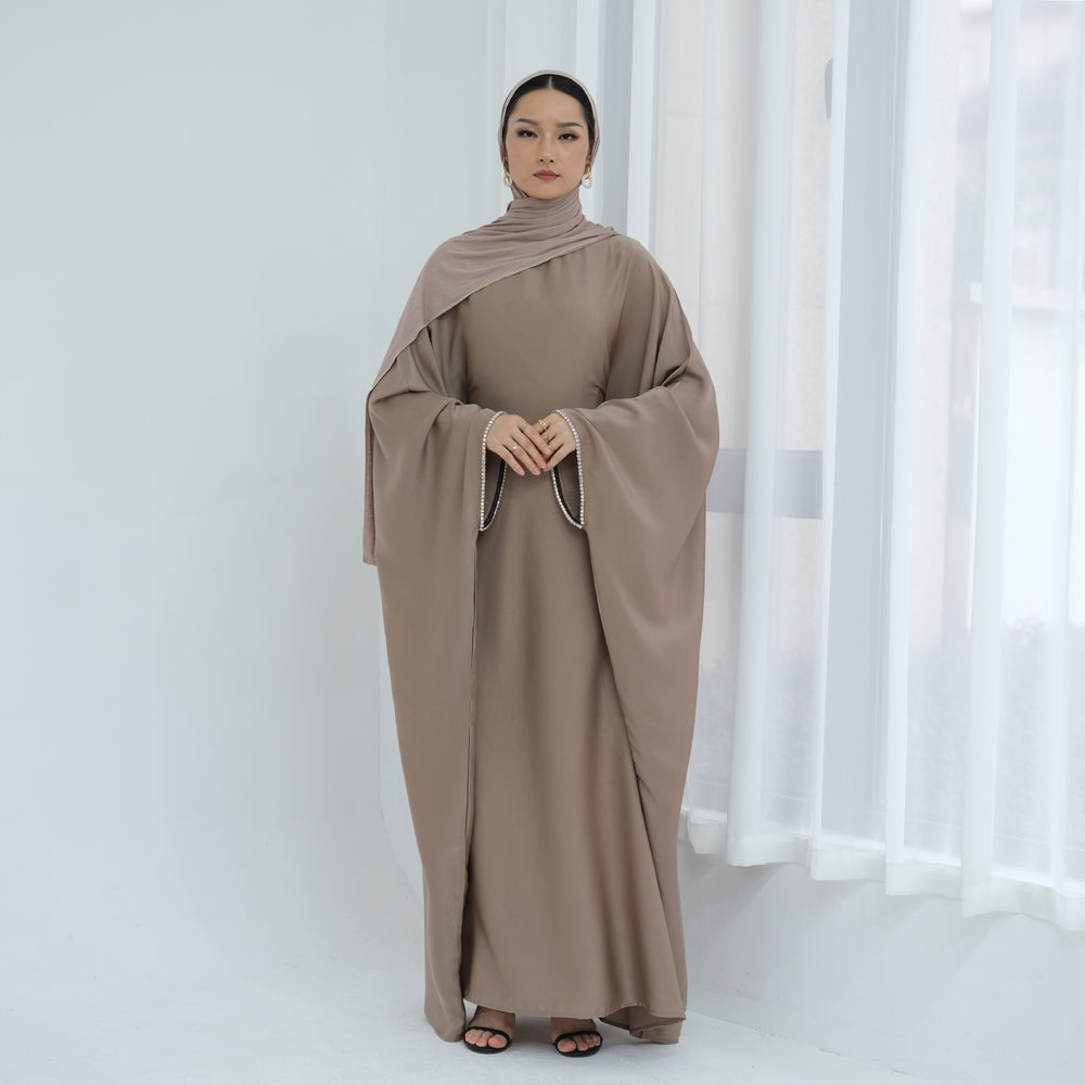 Get trendy with Davina Butterfly Satin Abaya - Taupe -  available at Voilee NY. Grab yours for $69.90 today!