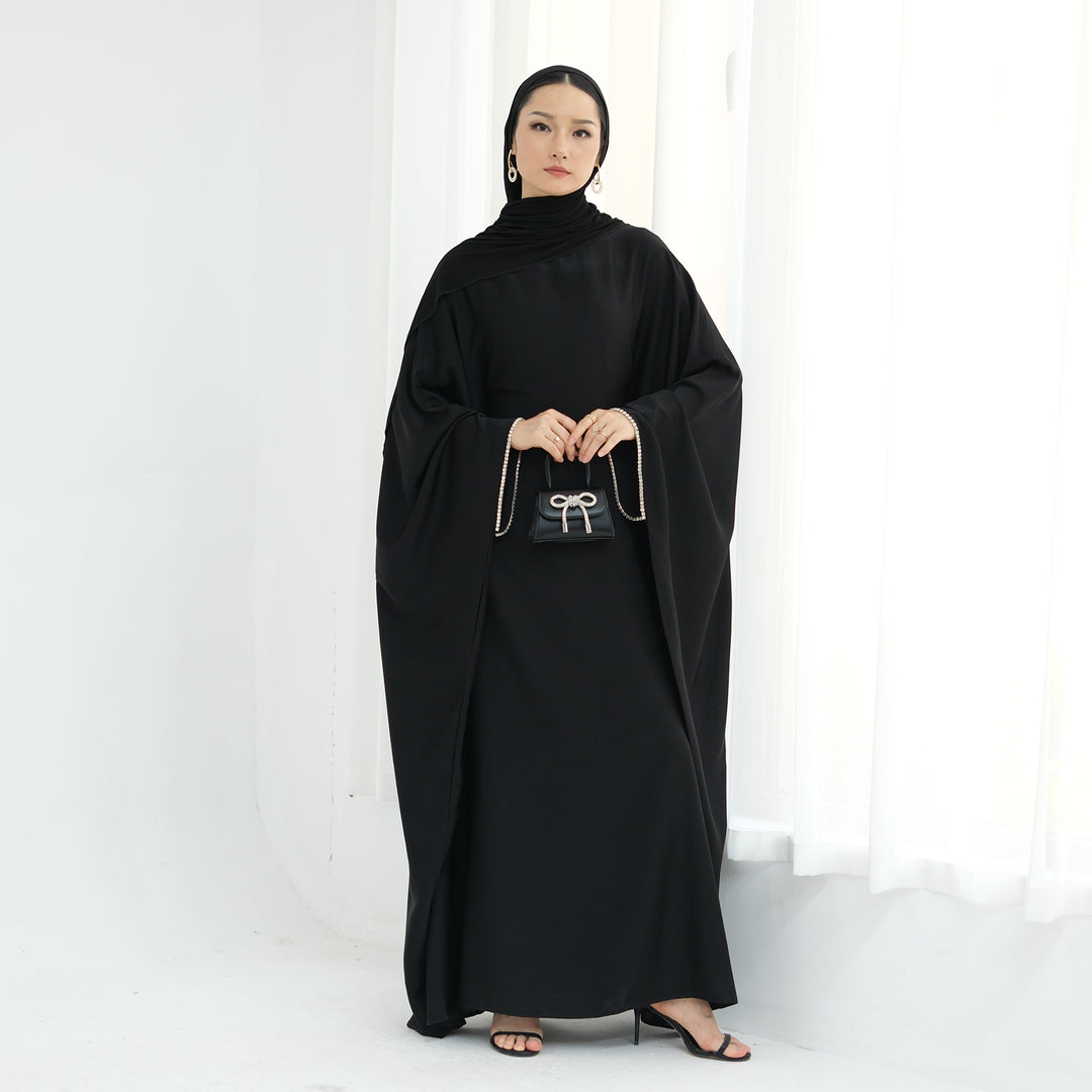 Get trendy with Davina Butterfly Satin Abaya - Black -  available at Voilee NY. Grab yours for $69.90 today!