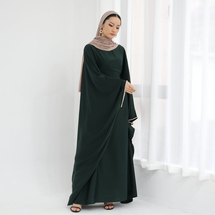 Get trendy with Davina Butterfly Satin Abaya - Emerald -  available at Voilee NY. Grab yours for $69.90 today!