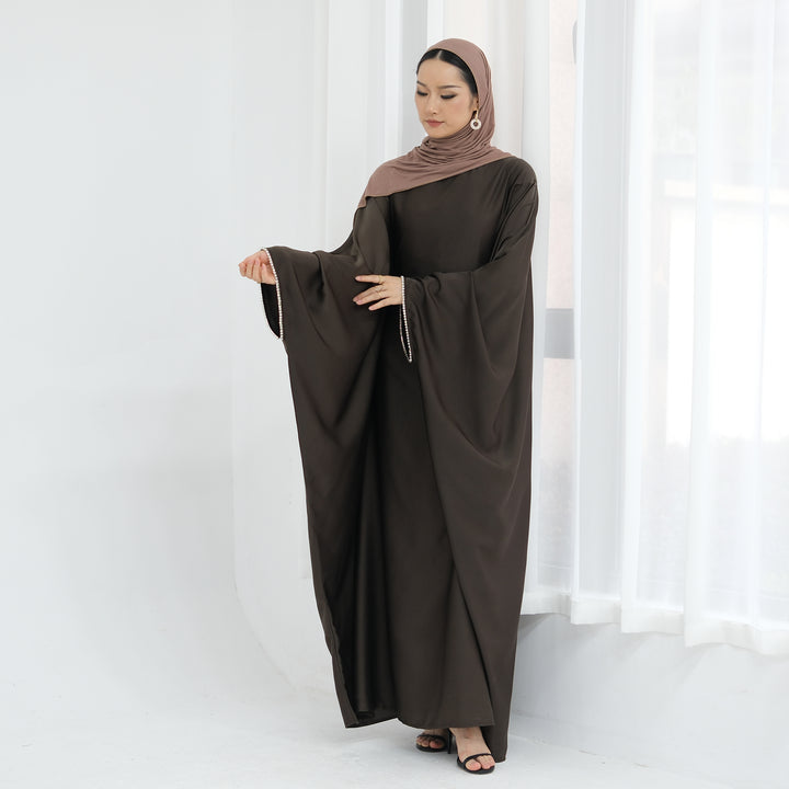 Get trendy with Davina Butterfly Satin Abaya - Coffee -  available at Voilee NY. Grab yours for $69.90 today!