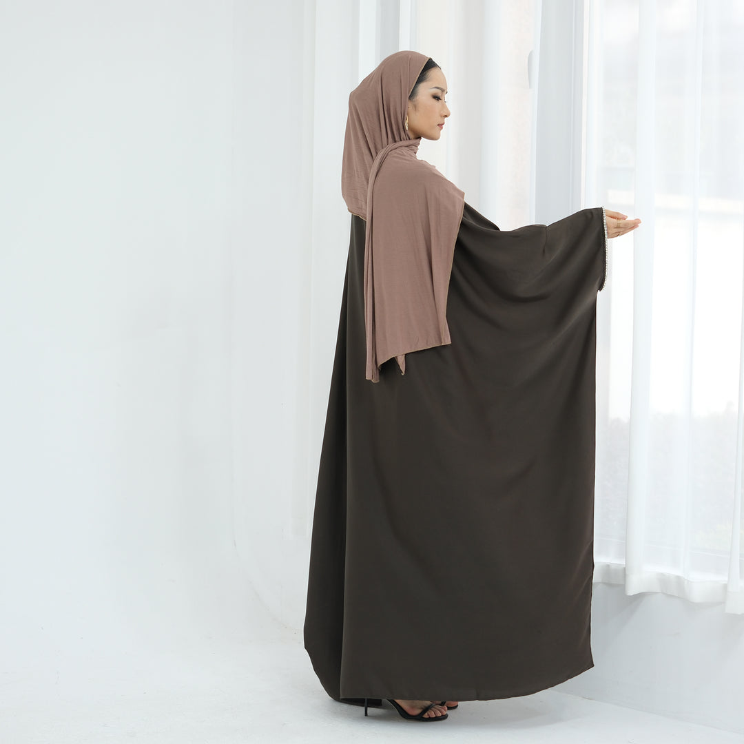 Get trendy with Davina Butterfly Satin Abaya - Coffee -  available at Voilee NY. Grab yours for $69.90 today!