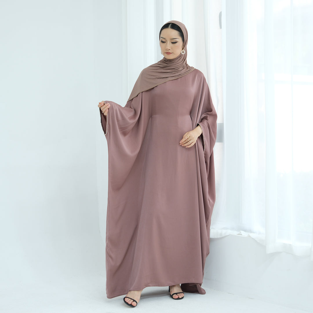 Get trendy with Davina Butterfly Satin Abaya - Mauve -  available at Voilee NY. Grab yours for $69.90 today!