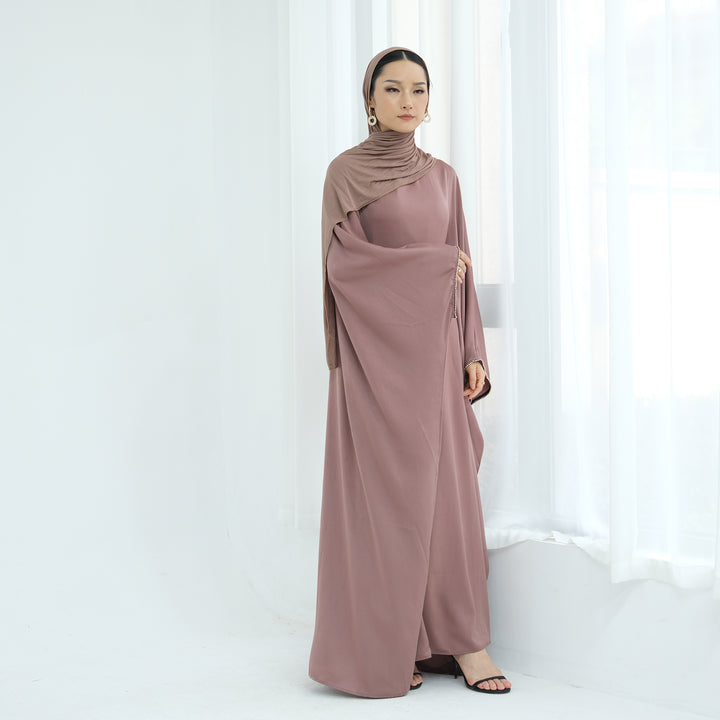 Get trendy with Davina Butterfly Satin Abaya - Mauve -  available at Voilee NY. Grab yours for $69.90 today!