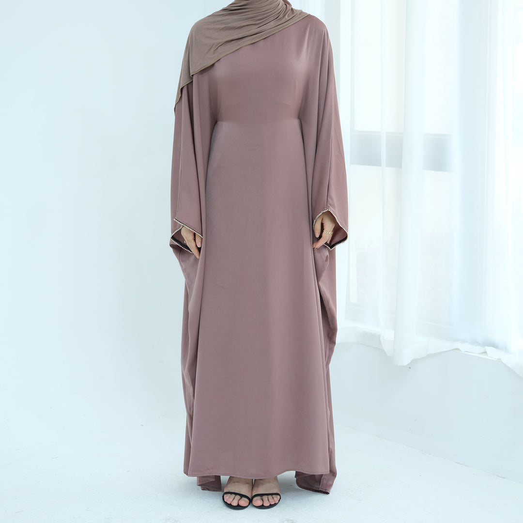 Get trendy with Davina Butterfly Satin Abaya - Mauve -  available at Voilee NY. Grab yours for $69.90 today!