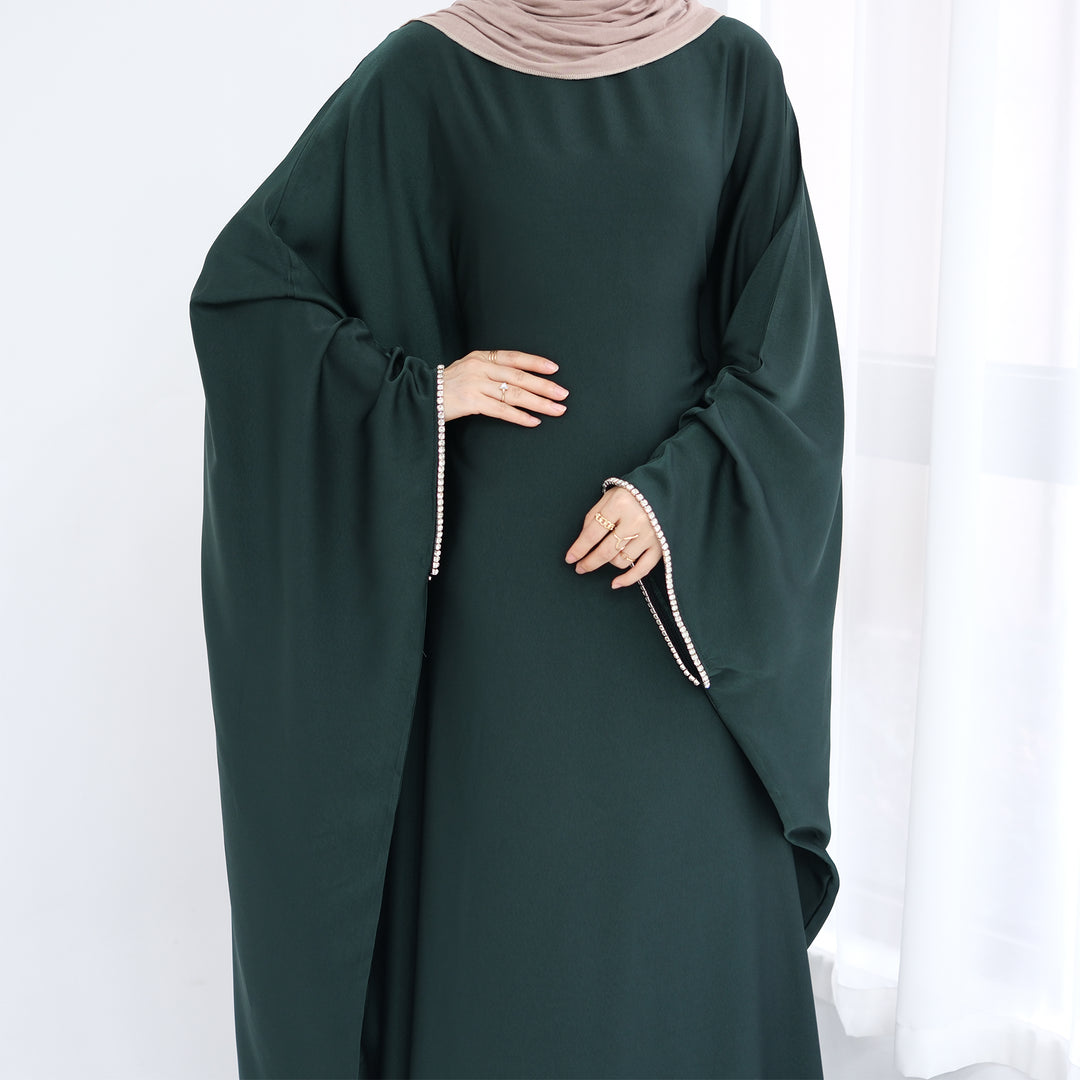 Get trendy with Davina Butterfly Satin Abaya - Emerald -  available at Voilee NY. Grab yours for $69.90 today!